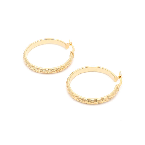 Arracadas facetadas en oro amarillo 14 kilates.