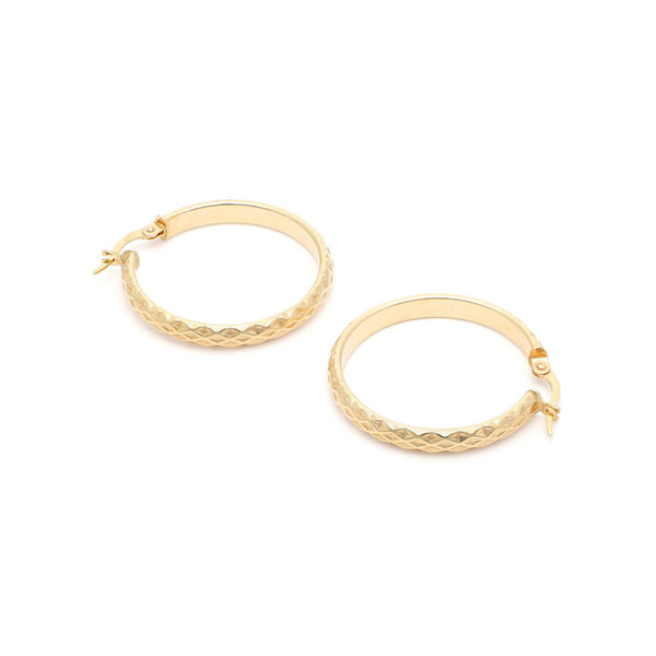 Arracadas facetadas en oro amarillo 14 kilates.