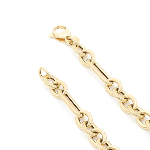 Pulsera eslabón combinado en oro amarillo 14 kilates.