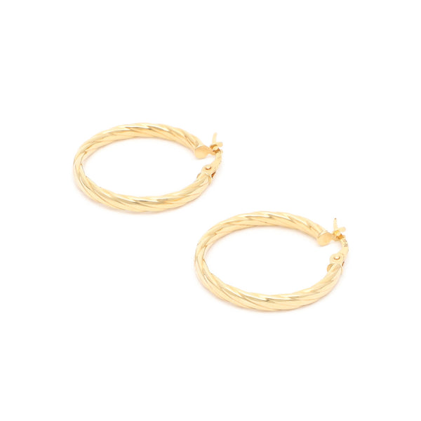 Arracadas torzal en oro amarillo 14 kilates.