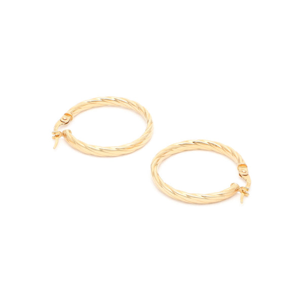 Arracadas torzal en oro amarillo 14 kilates.