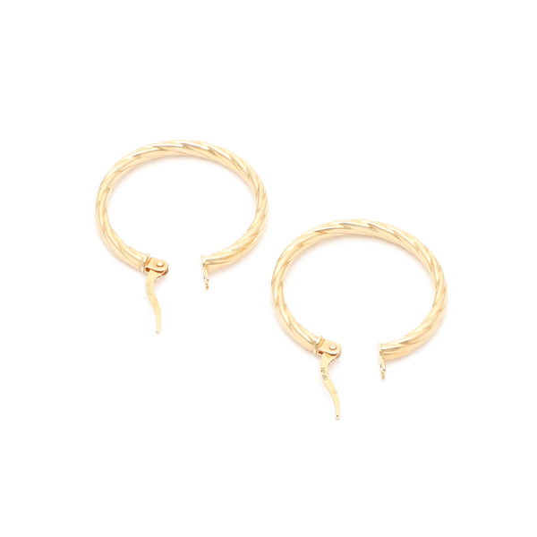 Arracadas torzal en oro amarillo 14 kilates.