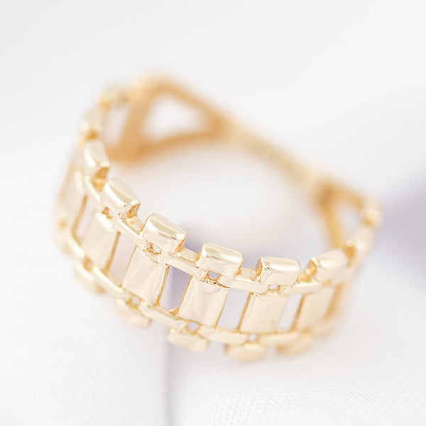 Anillo calado motivo riel en oro amarillo 14 kilates.
