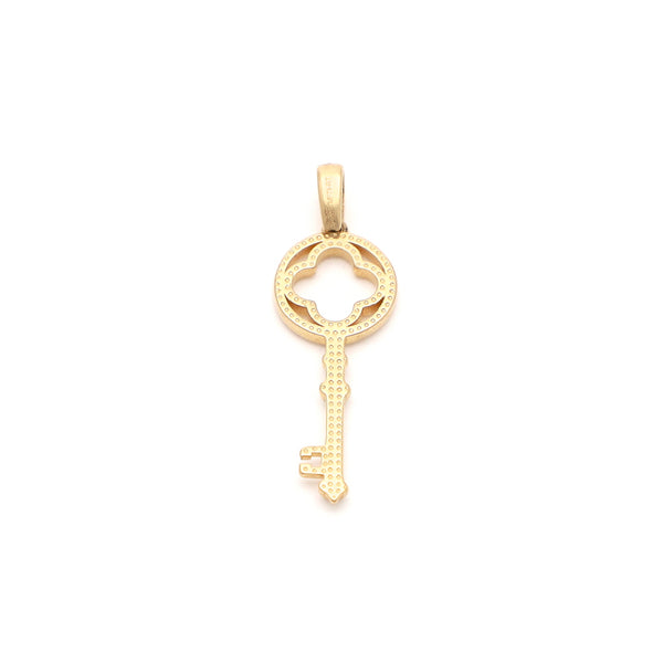 Dije diseño especial motivo llave en oro amarillo 14 kilates.
