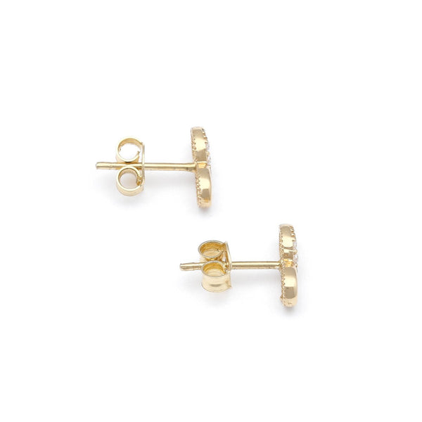 Aretes diseño especial con circonias motivo infinito en oro amarillo 14 kilates.