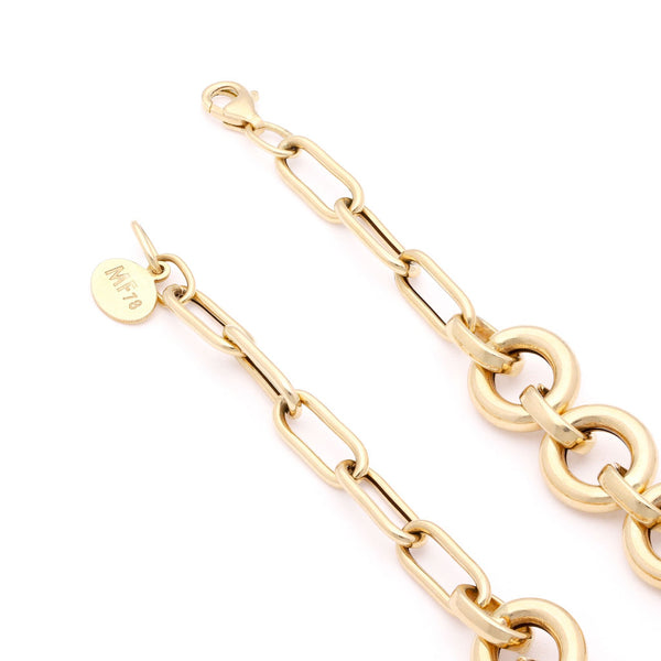Pulsera eslabón combinado en oro amarillo 14 kilates.