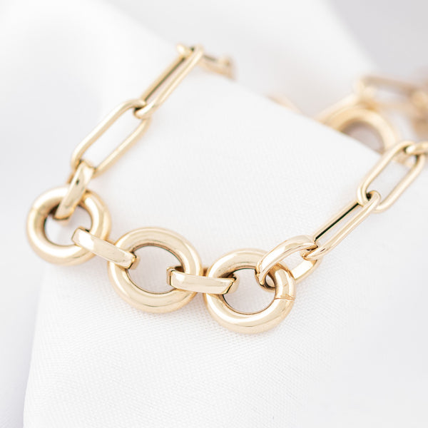 Pulsera eslabón combinado en oro amarillo 14 kilates.