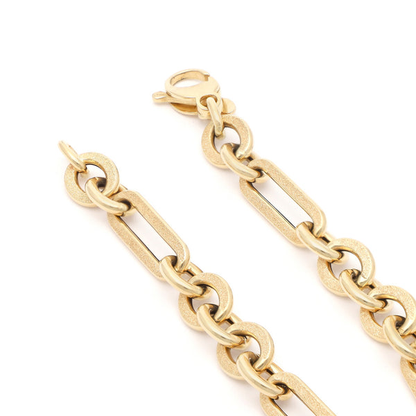Pulsera eslabón combinado en oro amarillo 14 kilates.