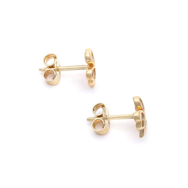 Aretes diseño especial con circonias motivo trébol en oro amarillo 14 kilates.