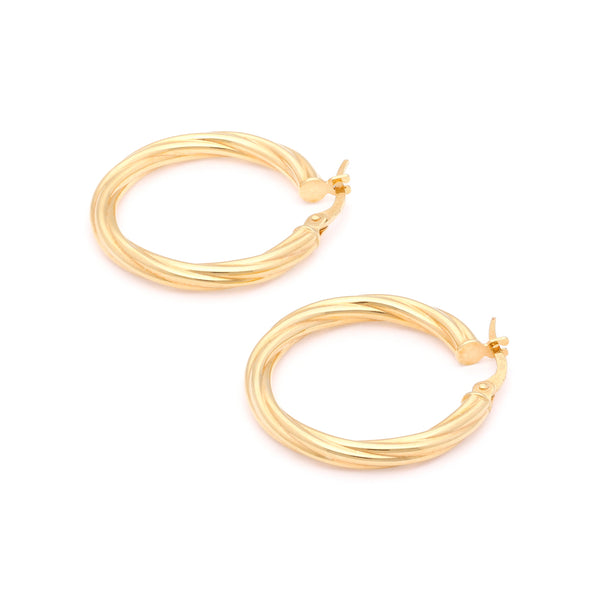 Arracadas torzal en oro amarillo 14 kilates.