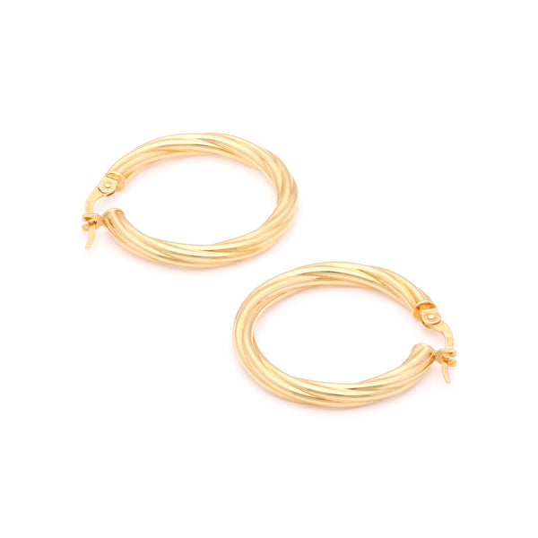 Arracadas torzal en oro amarillo 14 kilates.