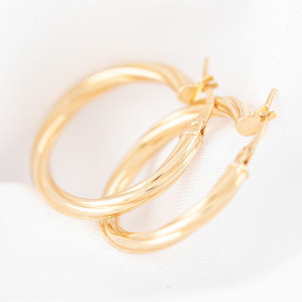 Arracadas torzal en oro amarillo 14 kilates.