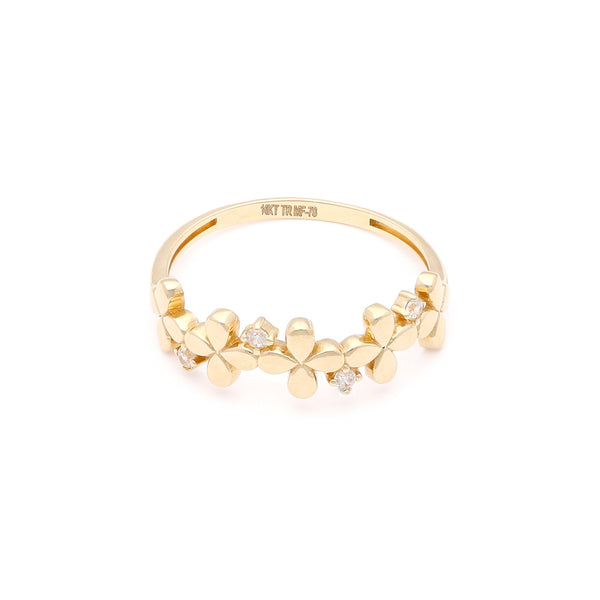 Anillo diseño especial motivo flores con circonias en oro amarillo 14 kilates.