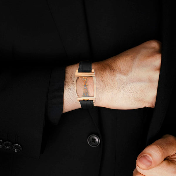 Reloj Corum para caballero modelo Golden Bridge caja y broche en oro rosa 18 kilates.