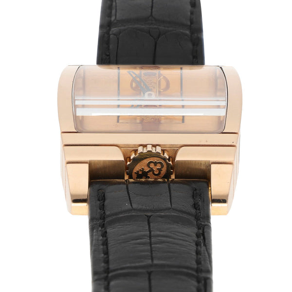 Reloj Corum para caballero modelo Golden Bridge caja y broche en oro rosa 18 kilates.