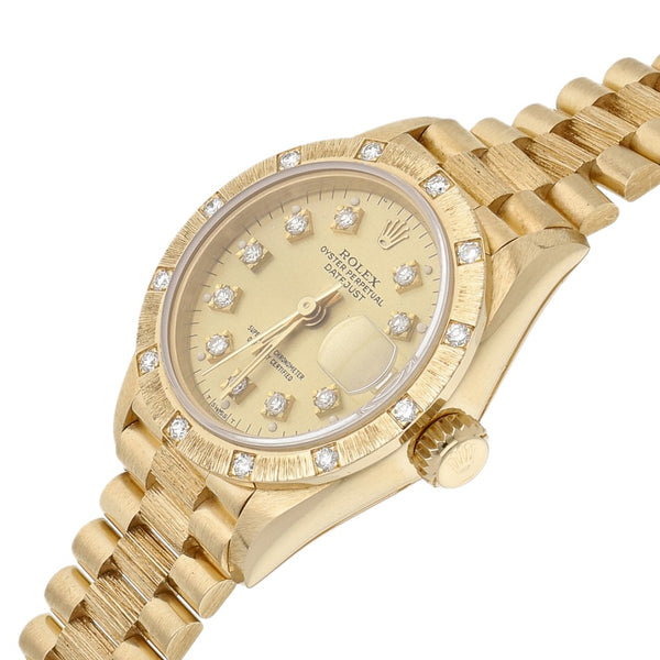 Reloj Rolex para dama modelo Oyster Perpetual DateJust en oro amarillo 18 kilates.