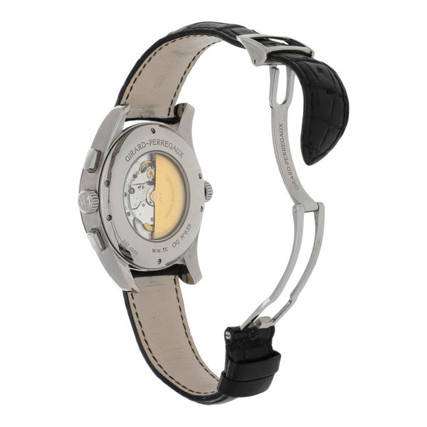 Reloj Girard Perregaux para caballero modelo WW.TC World Time Chronograph caja y broche en oro blanco 18 kilates.