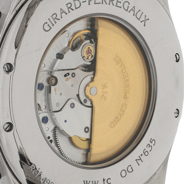 Reloj Girard Perregaux para caballero modelo WW.TC World Time Chronograph caja y broche en oro blanco 18 kilates.