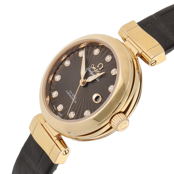 Reloj Omega para dama modelo De Ville Ladymatic caja y broche en oro rosa 18 kilates.