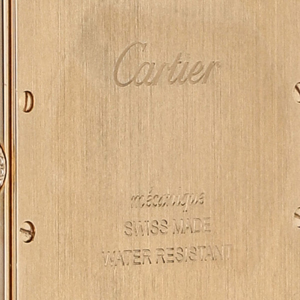 Reloj Cartier para caballero modelo Tank Louis caja y broche en oro rosa 18 kilates.