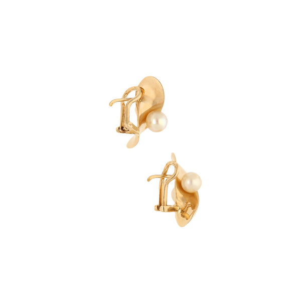 Aretes diseño especial con perlas en oro amarillo 14 kilates.