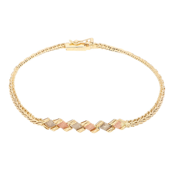 Pulsera eslabón boleado con aplicación en oro tres tonos 14 kilates.