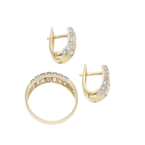 Juego de anillo y aretes diseño especial con circonias en oro amarillo 14 kilates.