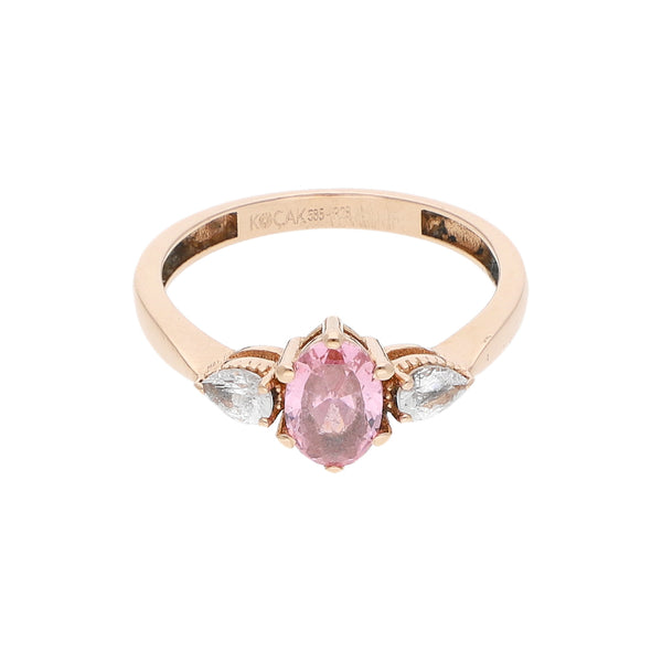 Anillo diseño especial con sintéticos en oro rosa 14 kilates.