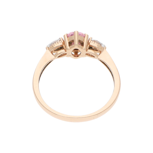Anillo diseño especial con sintéticos en oro rosa 14 kilates.