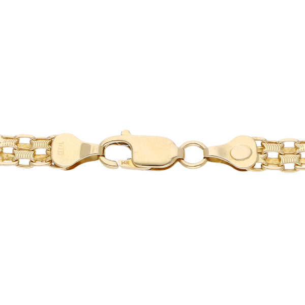 Pulsera eslabón combinado en oro amarillo 14 kilates.