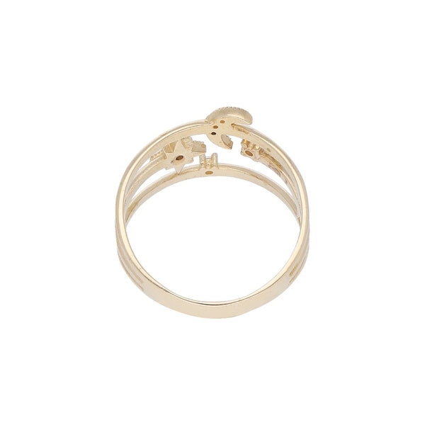 Anillo calado motivo luna y estrellas con sintéticos en oro rosa 14 kilates.
