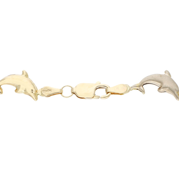 Pulsera eslabón combinado motivo delfín en oro tres tonos 14 kilates.
