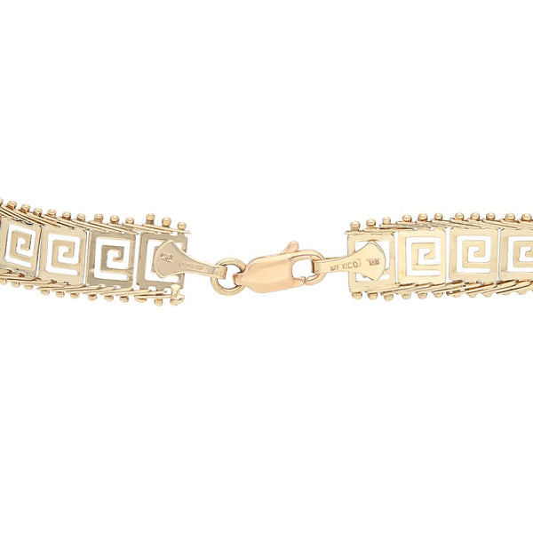 Pulsera eslabón boleado motivo grecas en oro amarillo 14 kilates.
