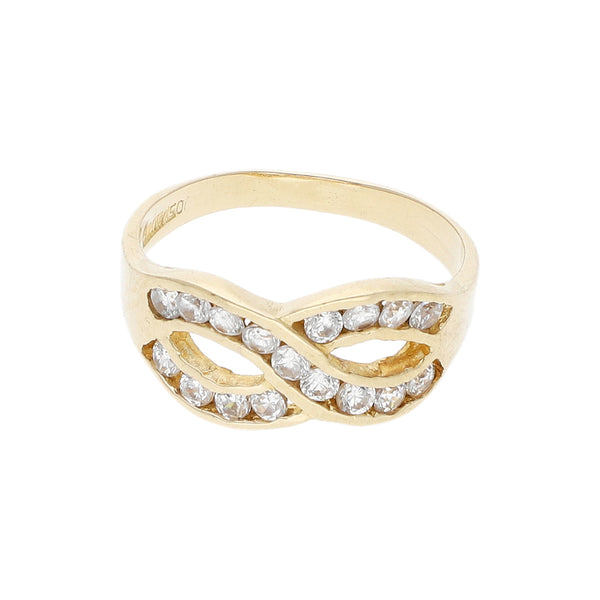 Anillo diseño especial con circonias motivo infinito en oro amarillo 14 kilates.