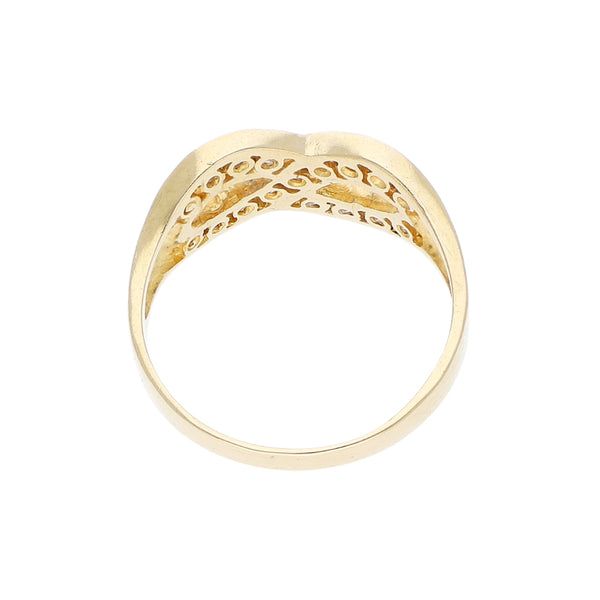 Anillo diseño especial con circonias motivo infinito en oro amarillo 14 kilates.