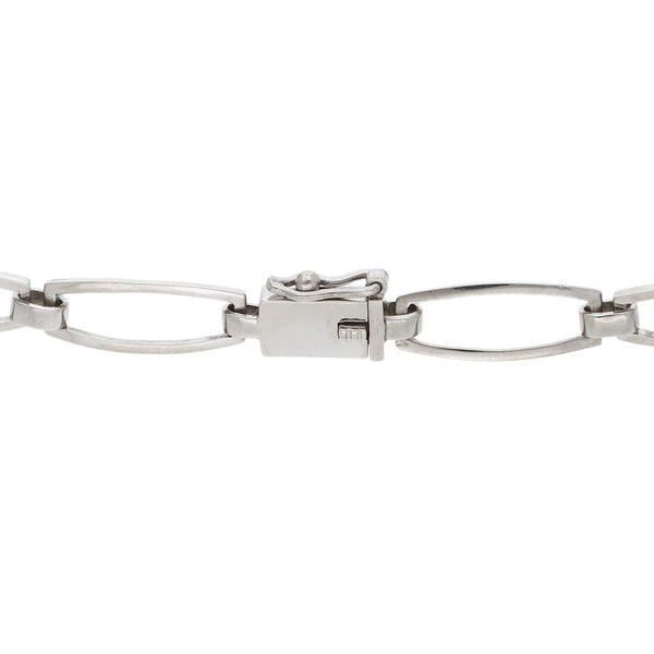 Pulsera eslabón articulado con esmeraldas en oro blanco 14 kilates.