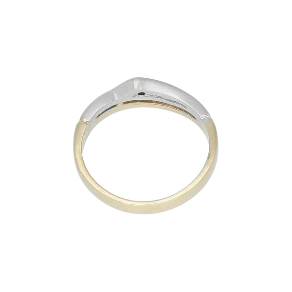 Anillo estilizado con diamante en oro dos tonos 14 kilates.