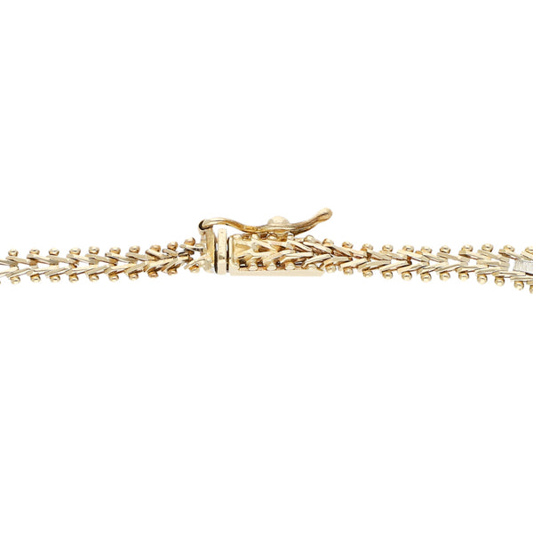 Pulsera eslabón boleado en oro tres tonos 14 kilates.