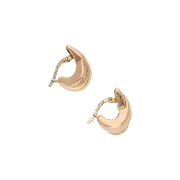 Aretes huecos en oro dos tonos 14 kilates.