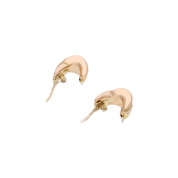 Aretes huecos en oro dos tonos 14 kilates.