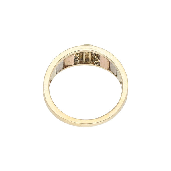 Anillo diseño especial en oro tres tonos 14 kilates.