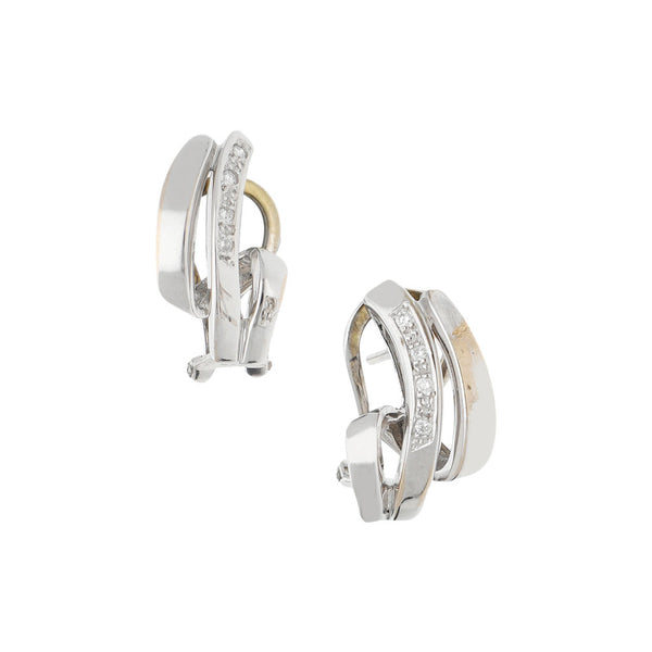 Aretes estilizados con diamantes en oro blanco 14 kilates.