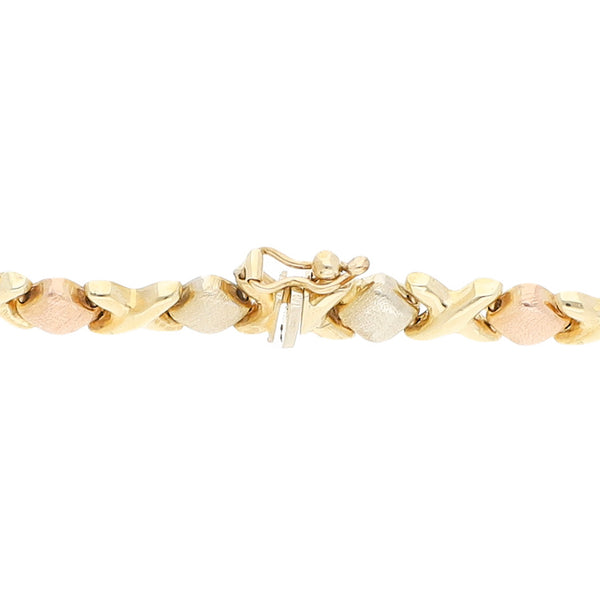 Pulsera eslabón XOXO en oro amarillo 14 kilates.