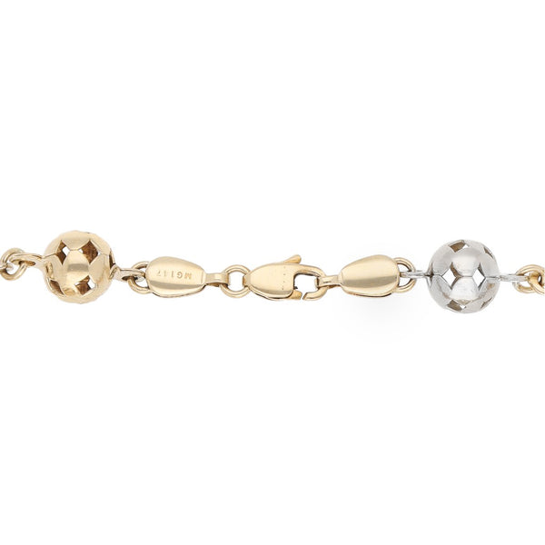 Pulsera eslabón boleado en oro tres tonos 14 kilates.