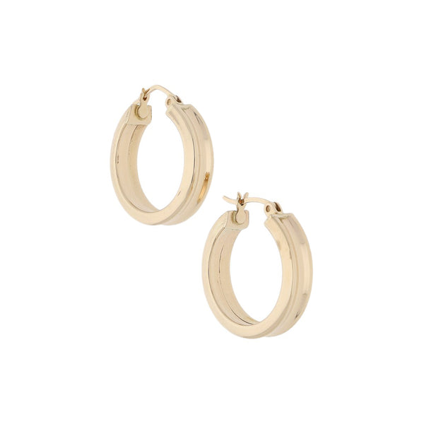 Arracadas huecas en oro amarillo 14 kilates.