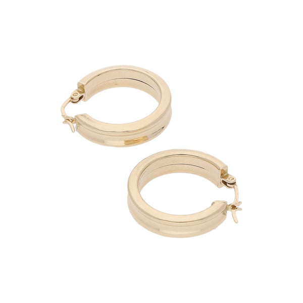 Arracadas huecas en oro amarillo 14 kilates.
