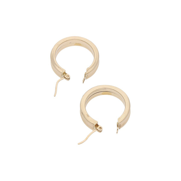 Arracadas huecas en oro amarillo 14 kilates.