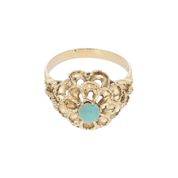 Anillo diseño especial con turquesa en oro amarillo 14 kilates.