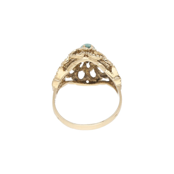 Anillo diseño especial con turquesa en oro amarillo 14 kilates.