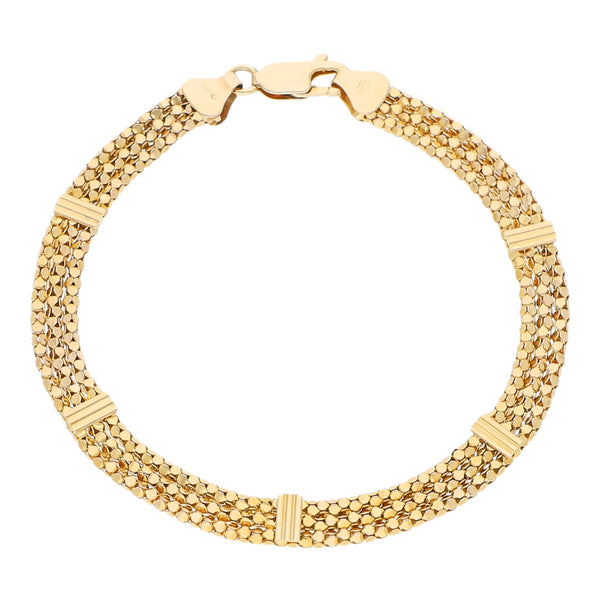 Pulsera de tres hilos eslabón laminado con aplicaciones en oro amarillo 14 kilates.